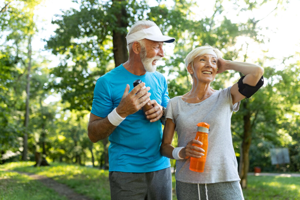 Mature couple jogging slider drescher physical therapy